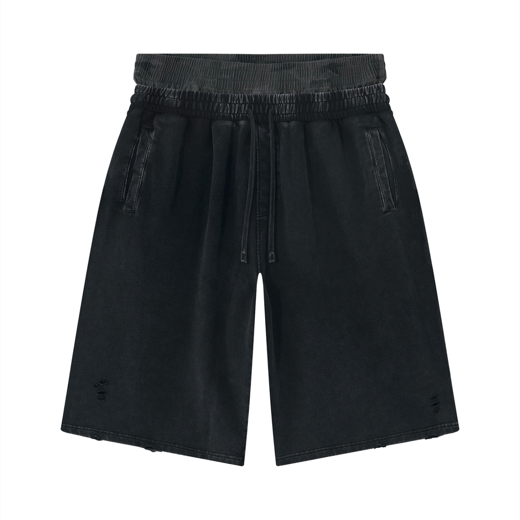 Black washed wide leg shorts with an elastic drawstring waist and front pockets.